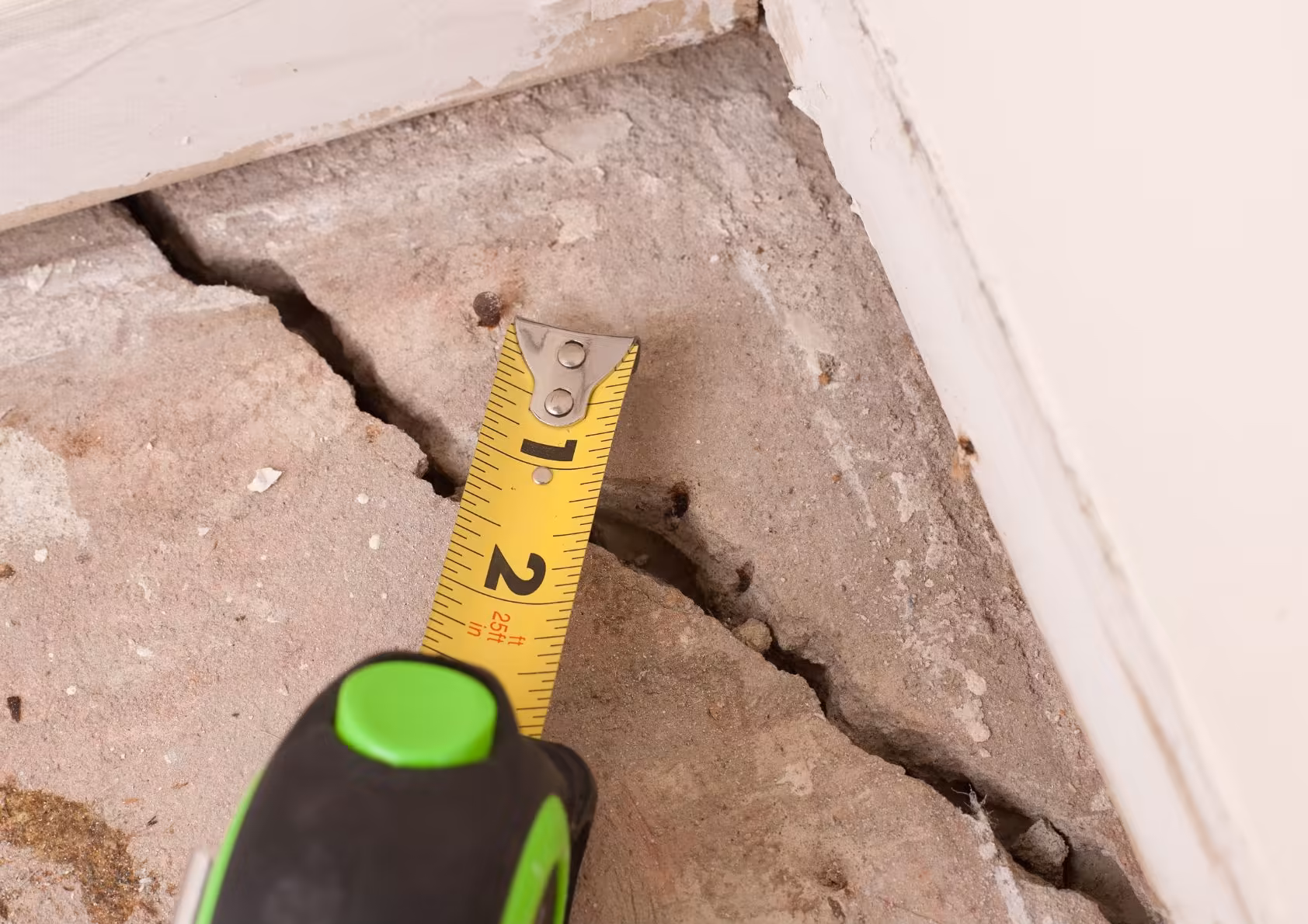 foundation cracks in the concrete in a home.