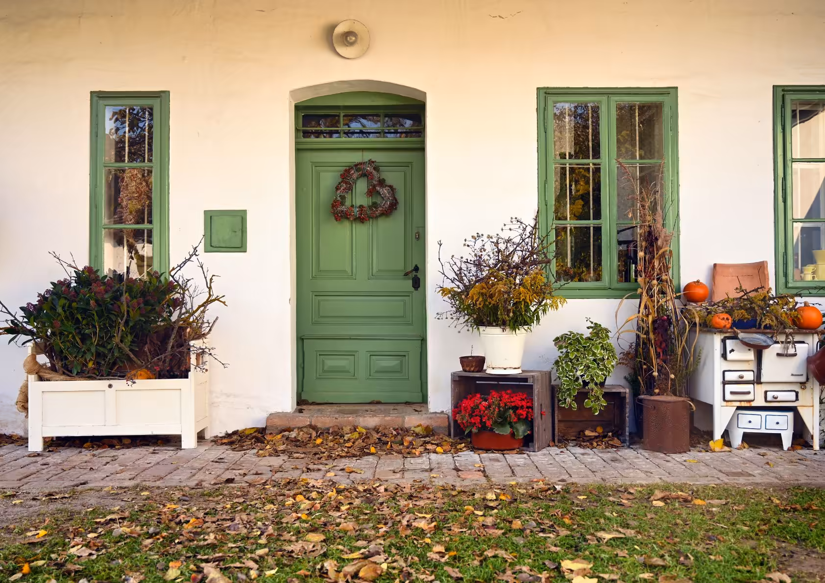 home exterior with the close up on the door and windows during fall/winter.