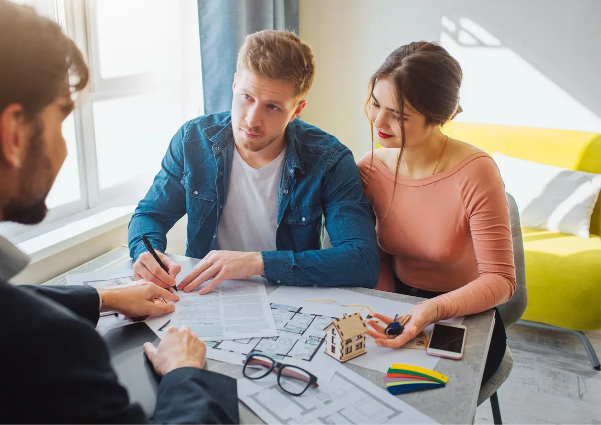 Couple discussing home options.
